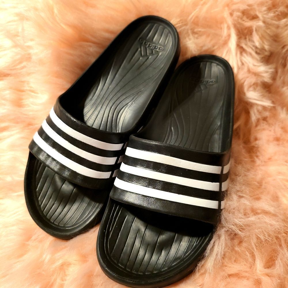 Addidas size 7 women's slides in excellent condition